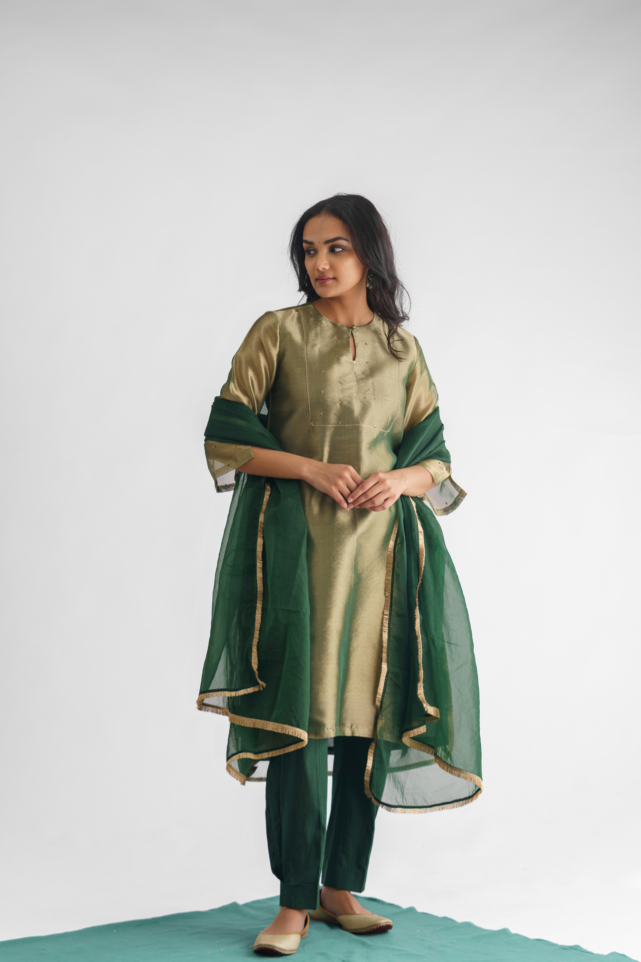Green organza dupatta with Kiran lace edging.